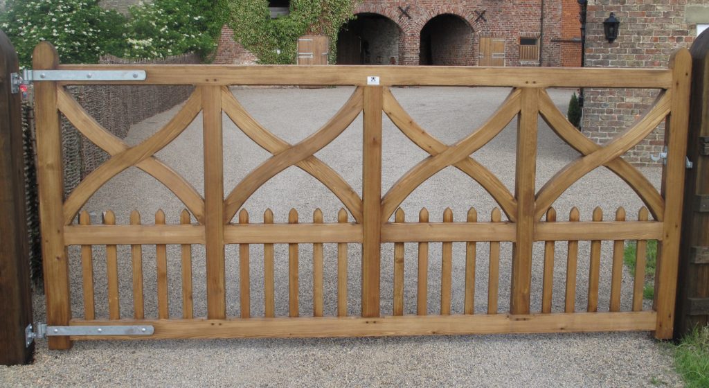 Wooden driveway gates with crosses