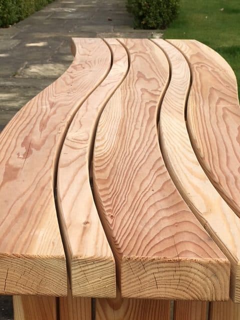curved wooden bench